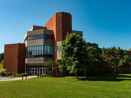 The Northern entrance of Acadia's Beveridge Arts Centre on a bright summer day.